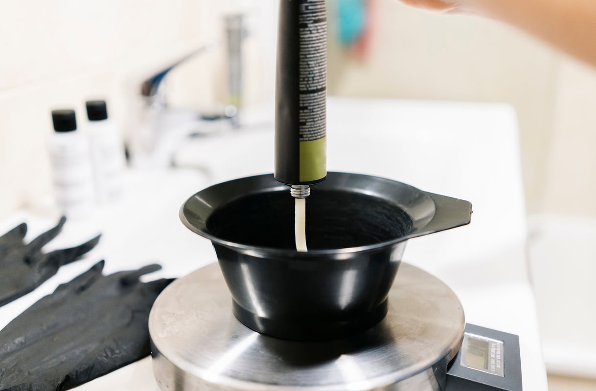 Putting Hair Colorant in a Black Bowl